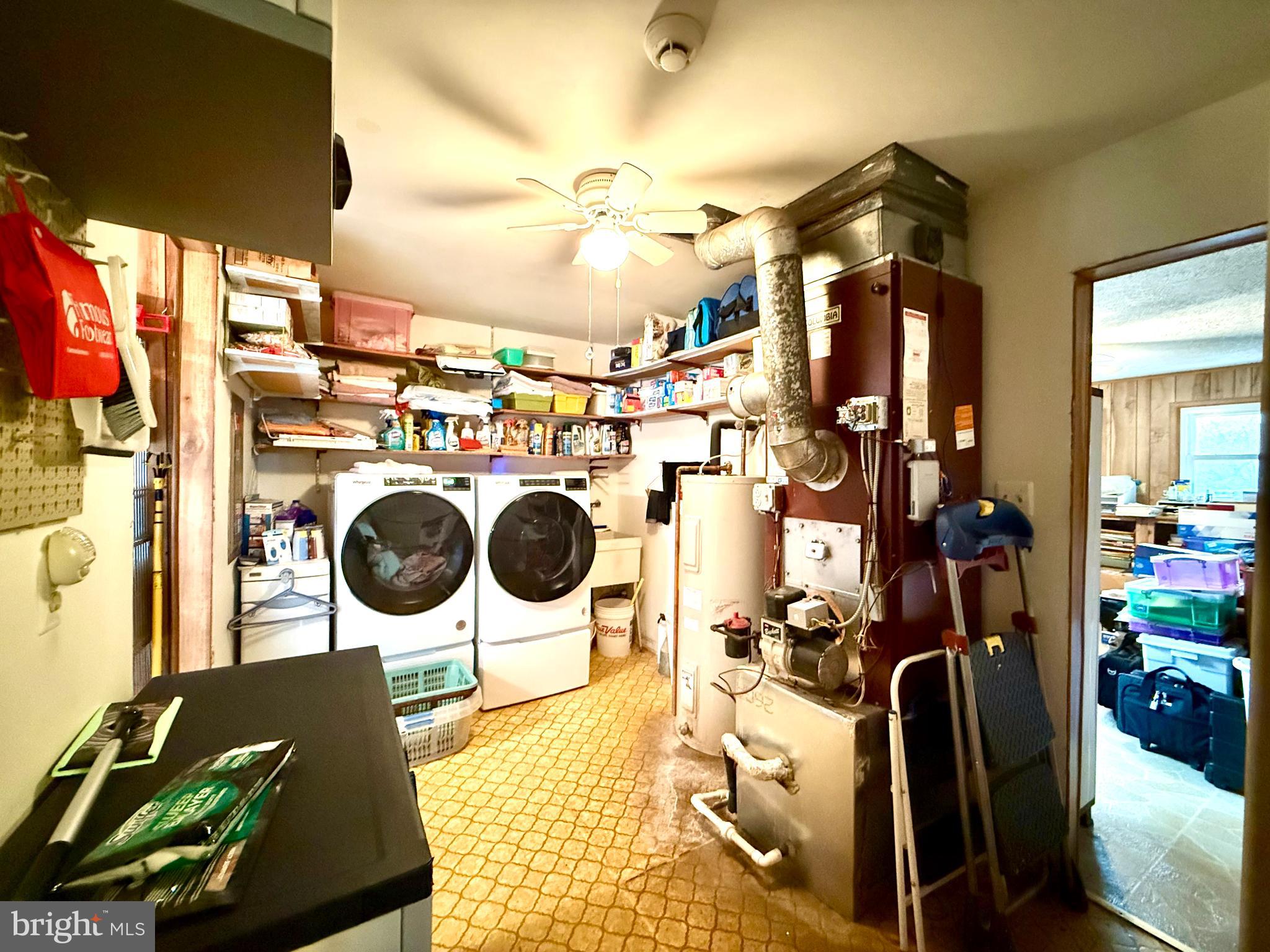 29866 Jefferson Road Mechanicsville, MD 20659 - Photo 18 of 43 Functional laundry space with ample storage.