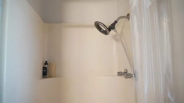 a bathroom with a toilet and a sink