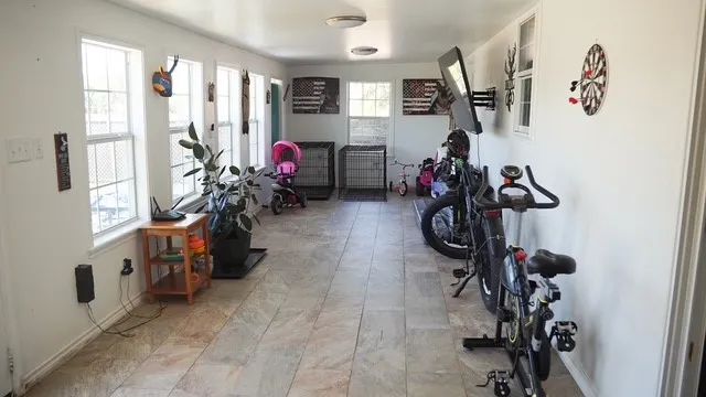 a view of a room with gym equipment