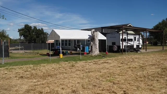 a view of a park with swings and slides