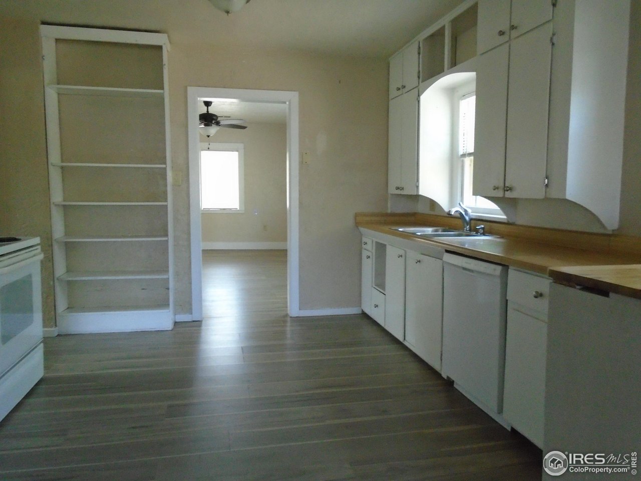 116 Walnut Street Windsor, CO 80550 - Photo 9 of 13 a bathroom with a sink and a mirror