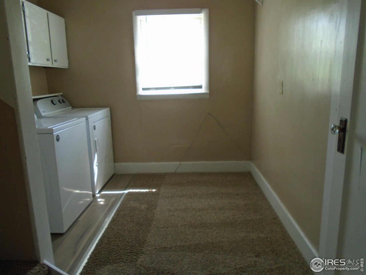 116 Walnut Street Windsor, CO 80550 - Photo 10 of 13 a room with storage and utility