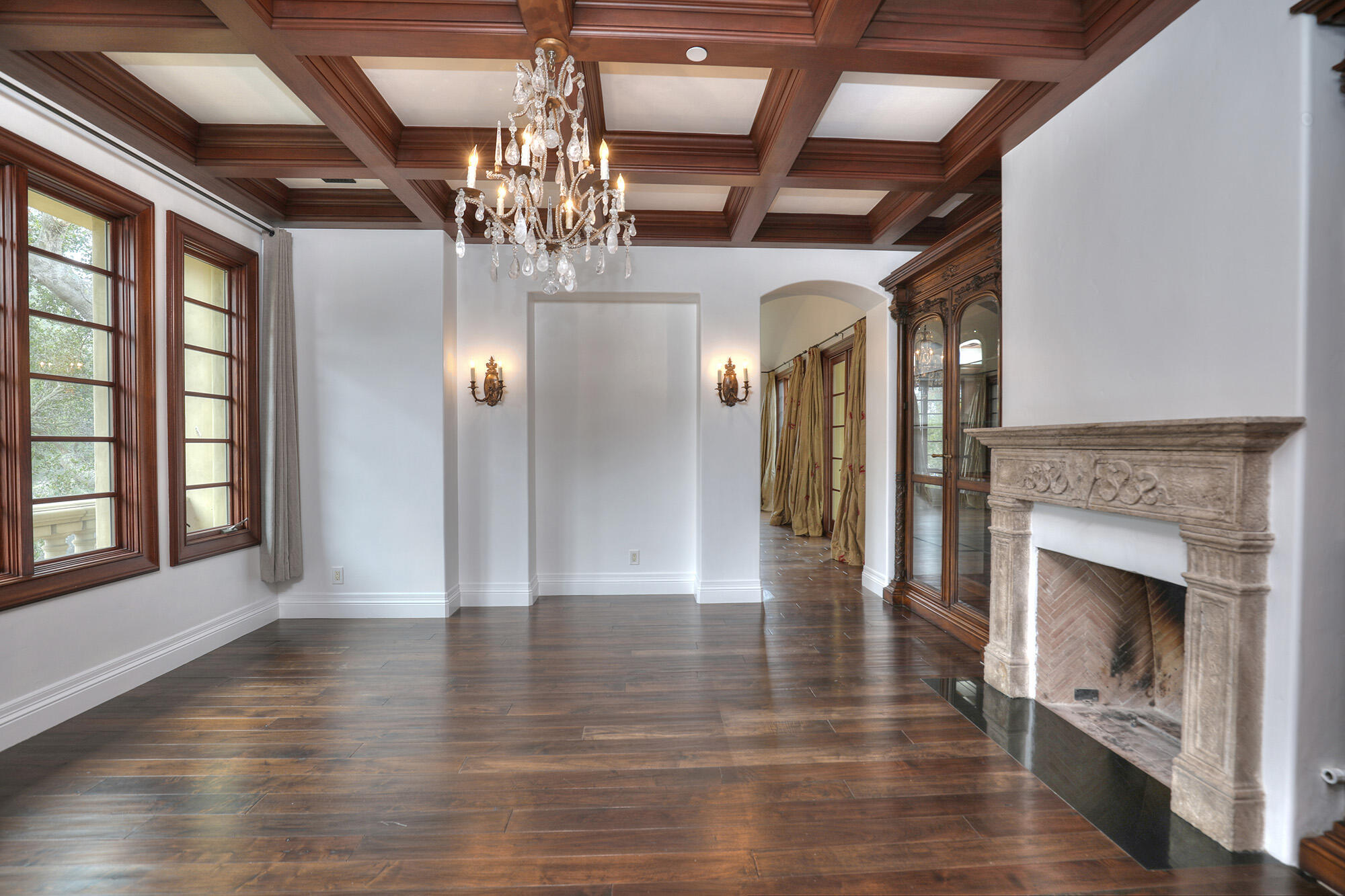 830 Park Lane Montecito, CA 93108 - Photo 18 of 40 a view of a big room with chandelier and fireplace