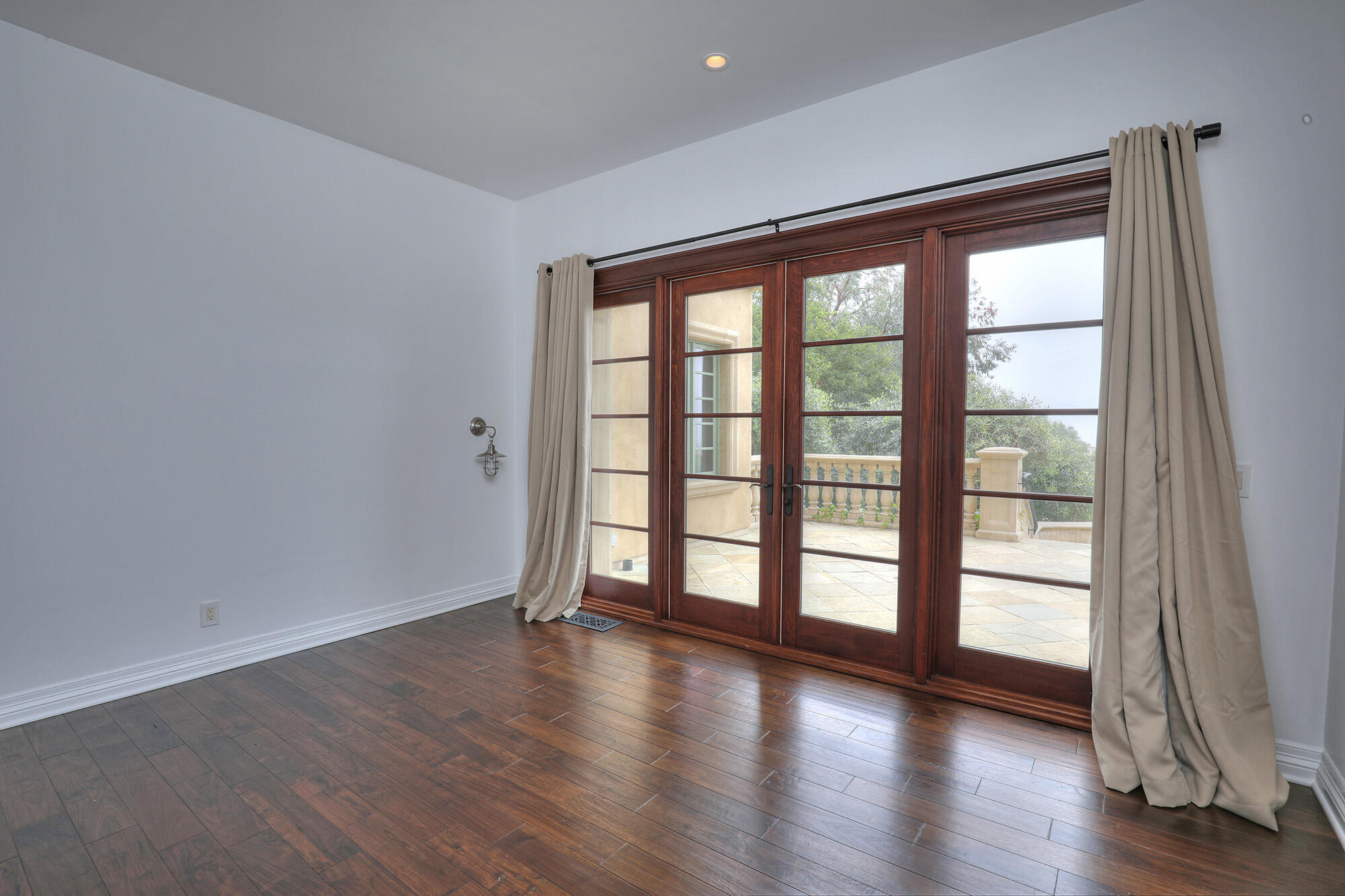 830 Park Lane Montecito, CA 93108 - Photo 26 of 40 wooden floor in an empty room with a window