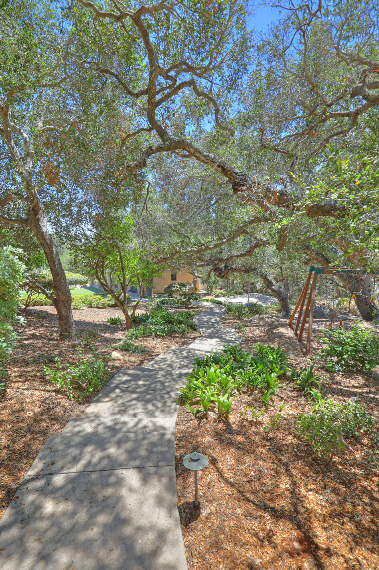 830 Park Lane Montecito, CA 93108 - Photo 40 of 40 a backyard of a house with a yard and outdoor seating