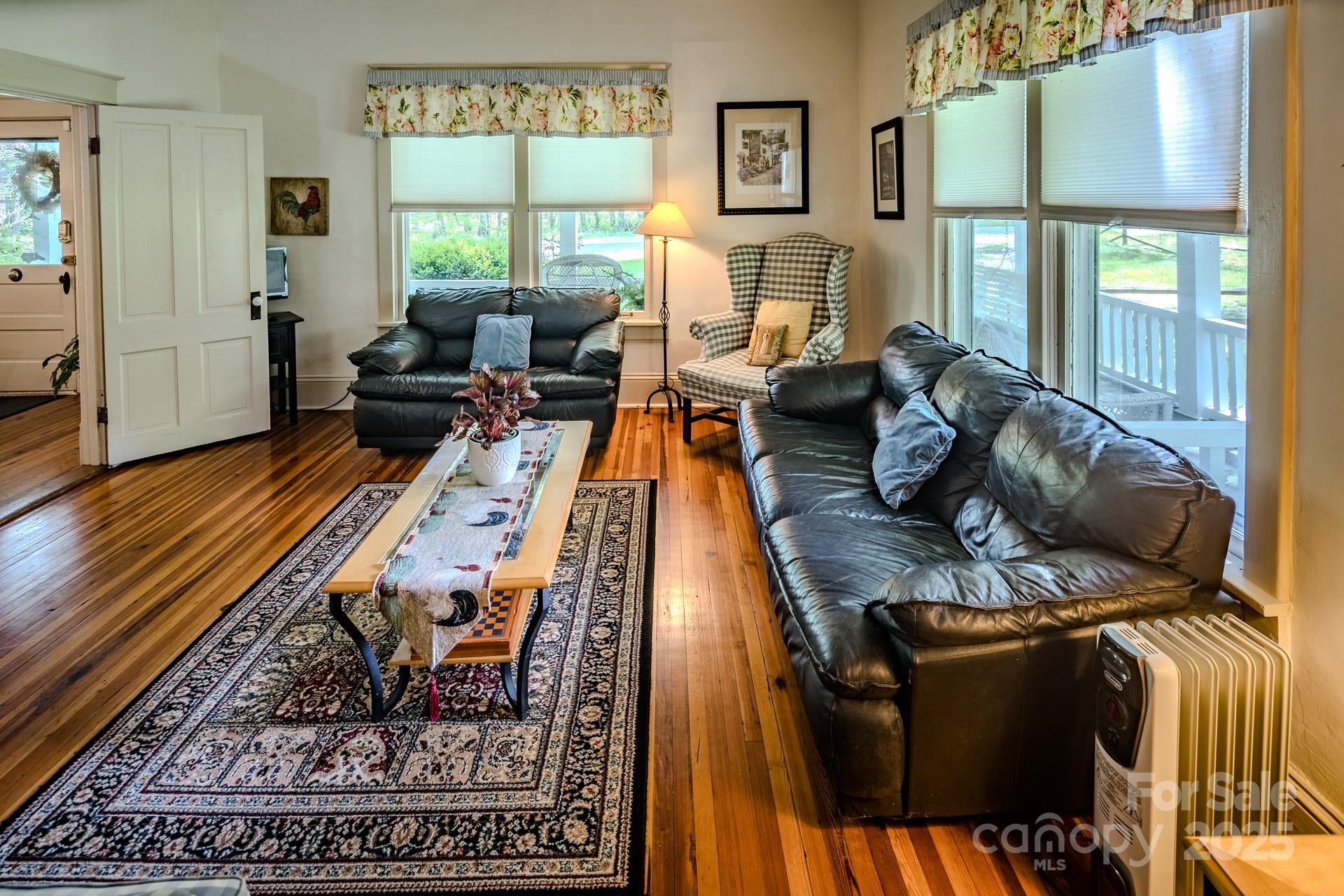 4584 Highway 194 Sugar Grove, NC 28679 - Photo 16 of 48 a living room with furniture and a rug