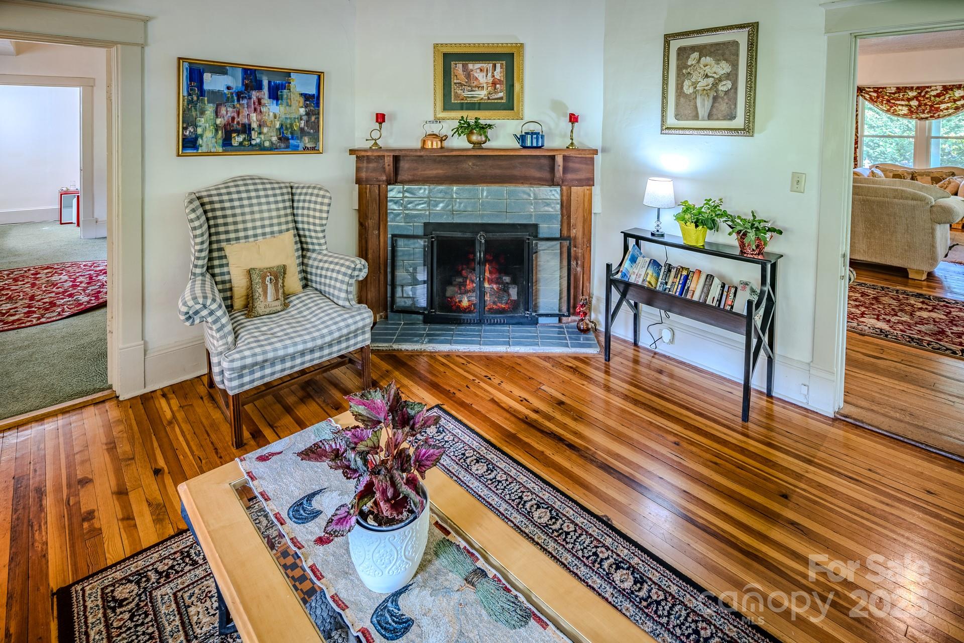 4584 Highway 194 Sugar Grove, NC 28679 - Photo 17 of 48 a living room with furniture and a fireplace