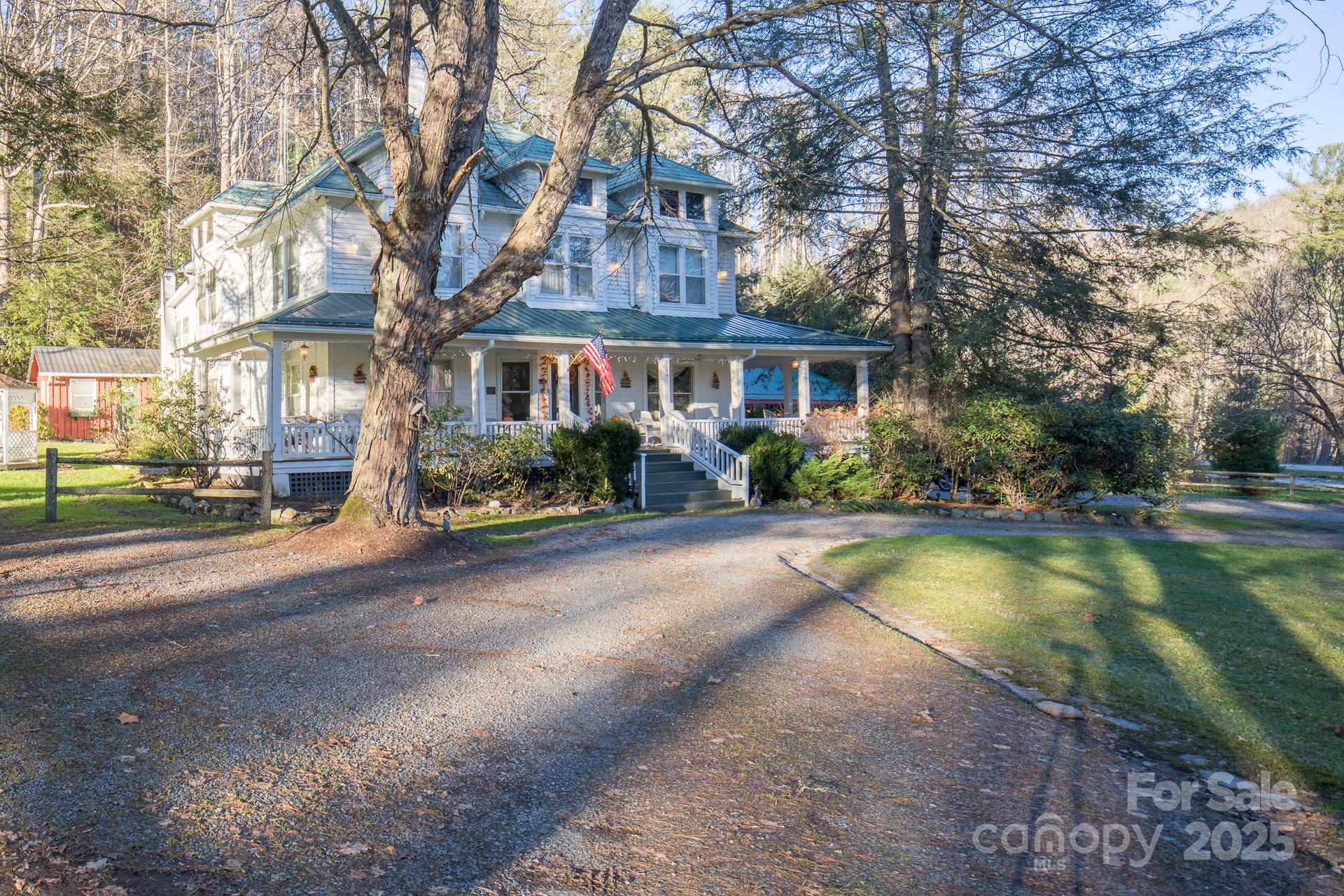 4584 Highway 194 Sugar Grove, NC 28679 - Photo 2 of 48 a front view of house with yard and green space