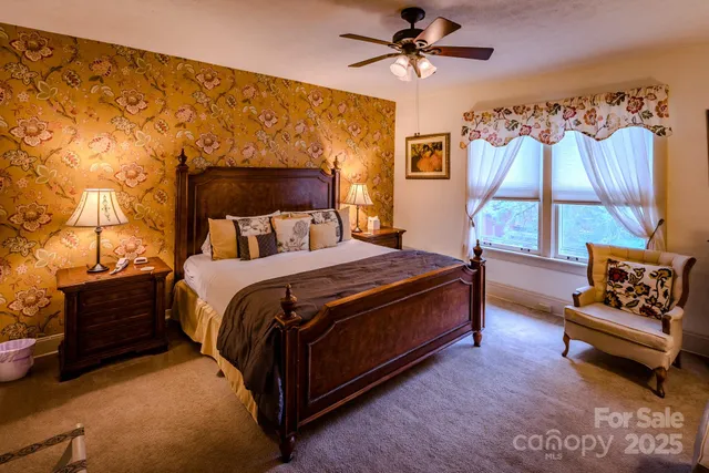 a bed room with a bed and a couch