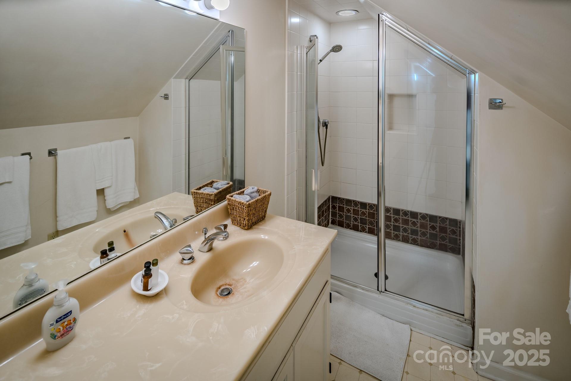 4584 Highway 194 Sugar Grove, NC 28679 - Photo 33 of 48 a bathroom with a tub sink vanity and mirror