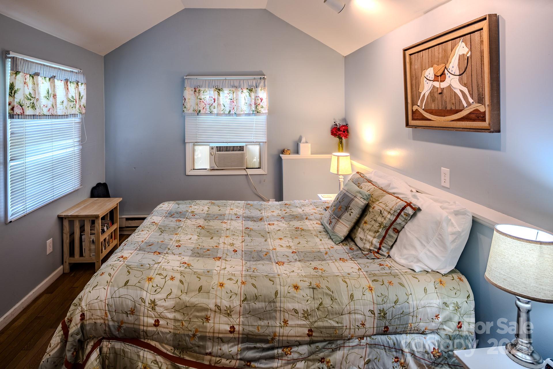 4584 Highway 194 Sugar Grove, NC 28679 - Photo 45 of 48 a bedroom with a bed and a window