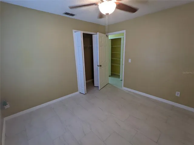 an empty room with a bathroom