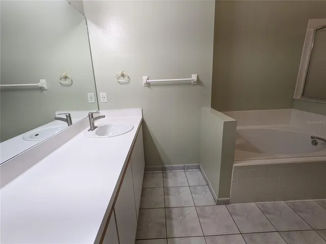 a bathroom with a sink and a bathtub