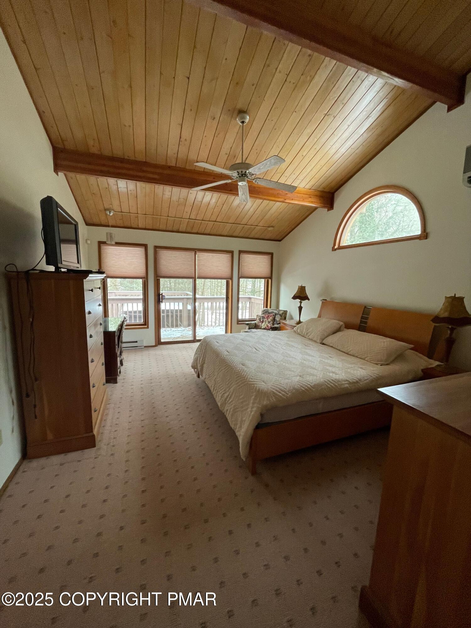 3530 Spruce Cabin Road Canadensis, PA 18325 - Photo 11 of 19 a bedroom with bed and window