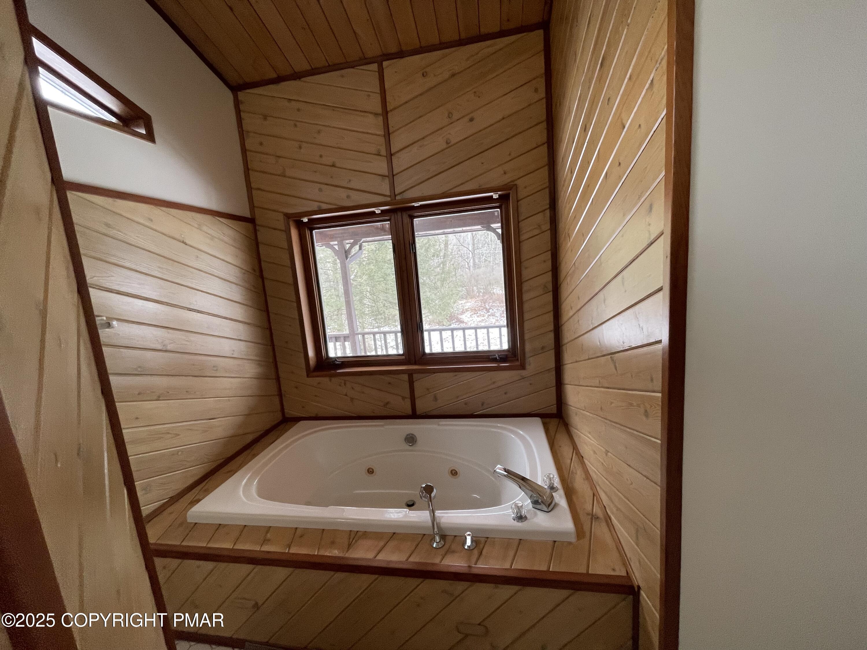 3530 Spruce Cabin Road Canadensis, PA 18325 - Photo 14 of 19 a bathroom with a tub and shower