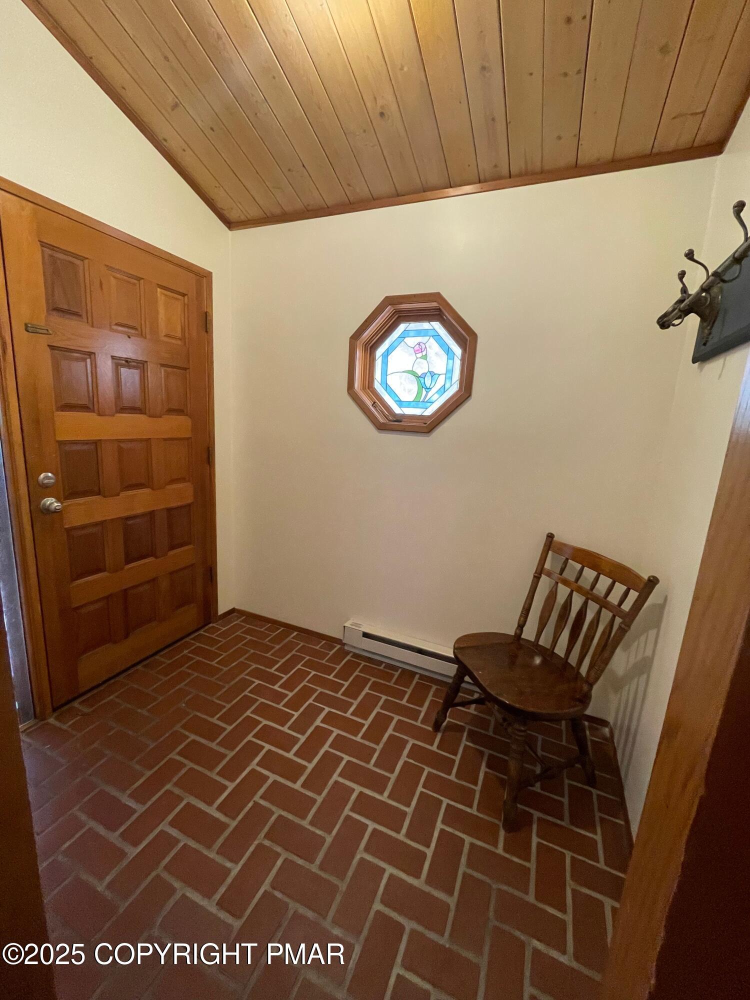 3530 Spruce Cabin Road Canadensis, PA 18325 - Photo 4 of 19 a view of workspace with wooden wall