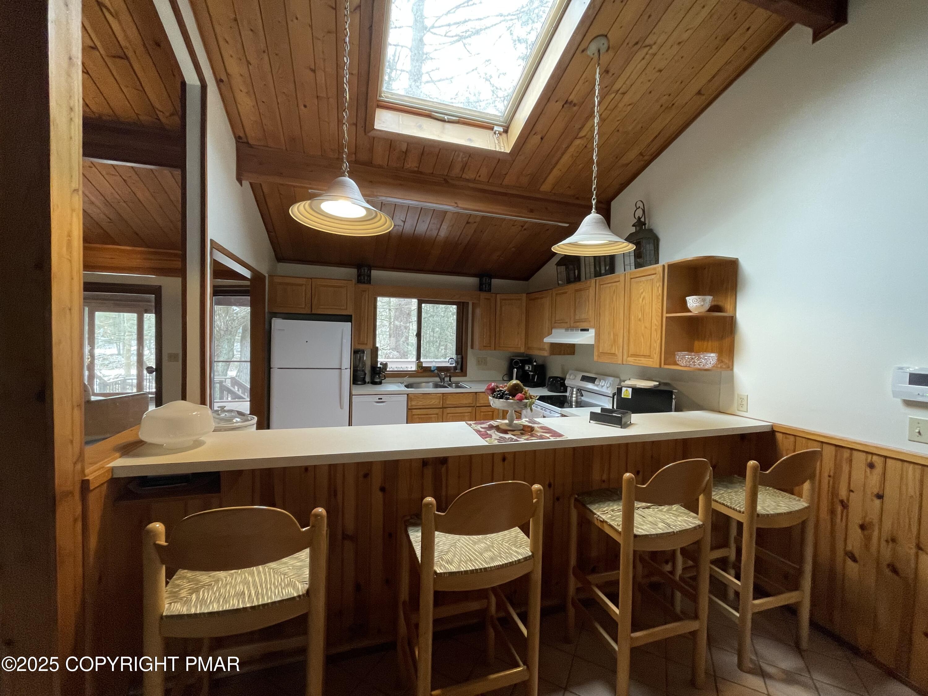 3530 Spruce Cabin Road Canadensis, PA 18325 - Photo 9 of 19 a dining table with chairs and window