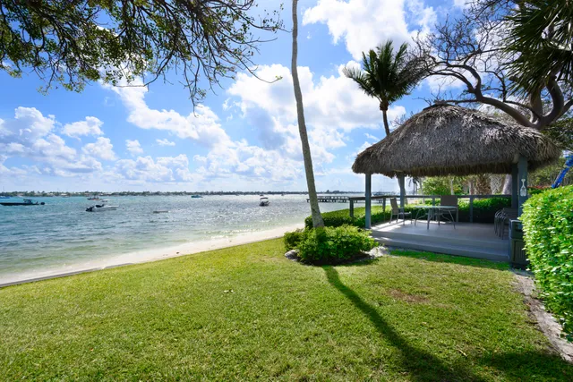 a view of a balcony with lake view and mountain view