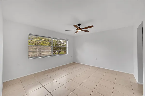 a view of an empty room and window