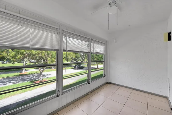 a view of a room with a large window