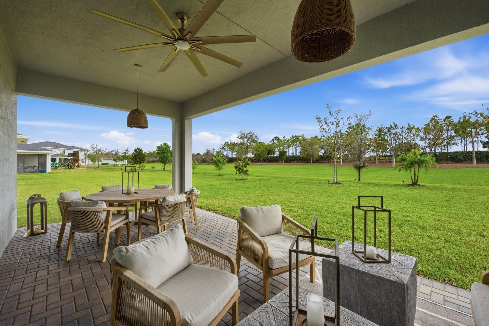 732 Hookline Circle Loxahatchee, FL 33470 - Photo 34 of 83 Covered Patio