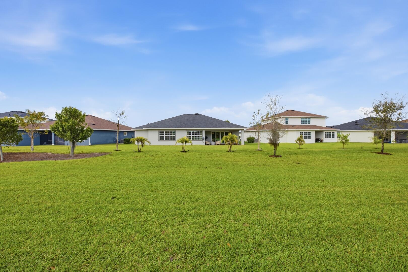 732 Hookline Circle Loxahatchee, FL 33470 - Photo 36 of 83 Back of Home