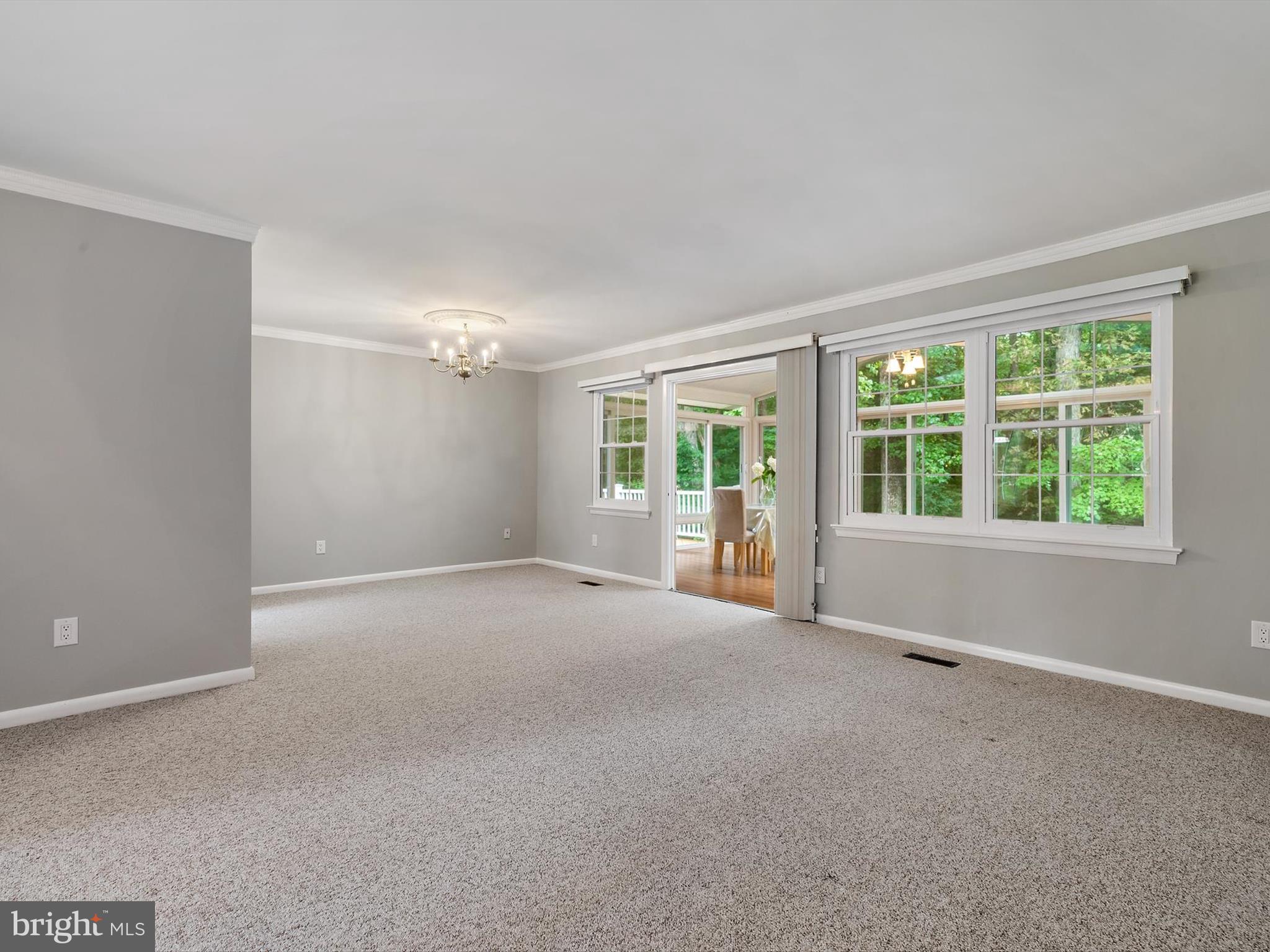 2213 Kings House Road Silver Spring, MD 20905 - Photo 11 of 37 LIVING ROOM OPENING TO 4 SEASONS ROOM