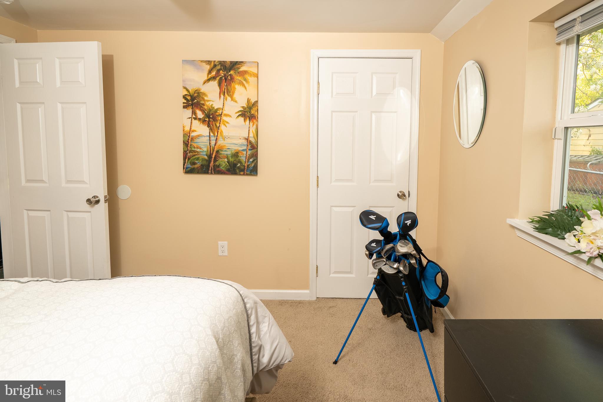 1816 Cremen Road Pasadena, MD 21122 - Photo 18 of 46 a bedroom with a bed and a painting on the wall