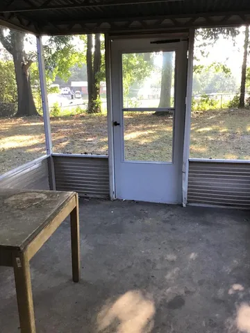a view of floor and window in an empty room