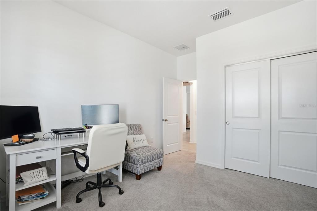 5365 Cappleman Loop Brooksville, FL 34601 - Photo 30 of 52 a view of a workspace with furniture and a bathroom