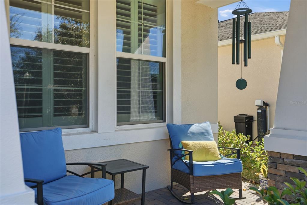 5365 Cappleman Loop Brooksville, FL 34601 - Photo 4 of 52 a view of a house with a chairs and table in a patio