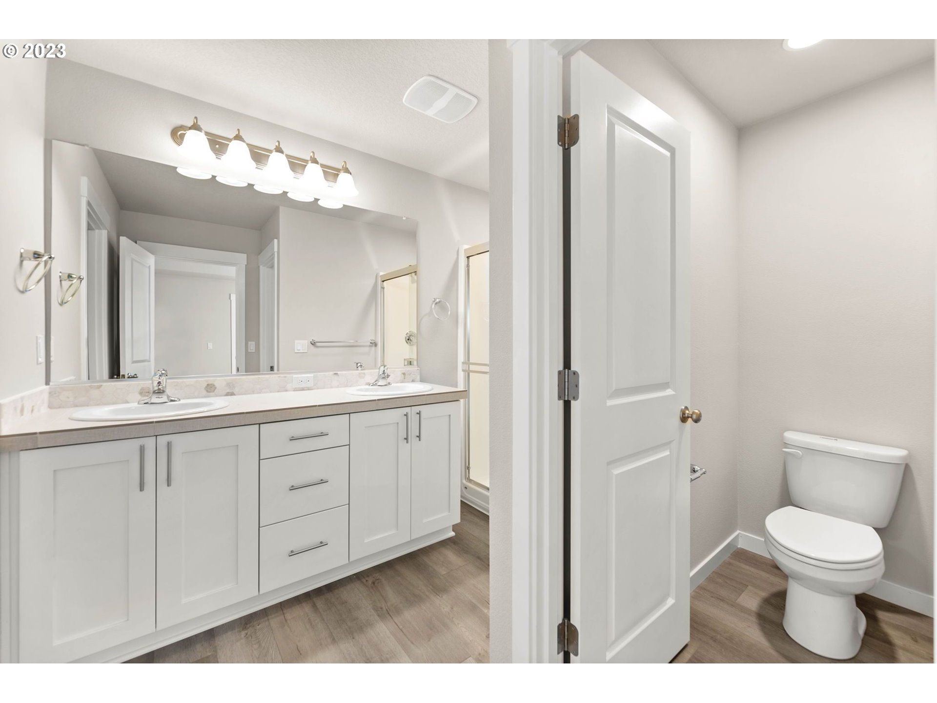 3147 South Kodiak Street, Unit LT798 Cornelius, OR 97113 - Photo 15 of 24 a bathroom with a toilet sink and a mirror