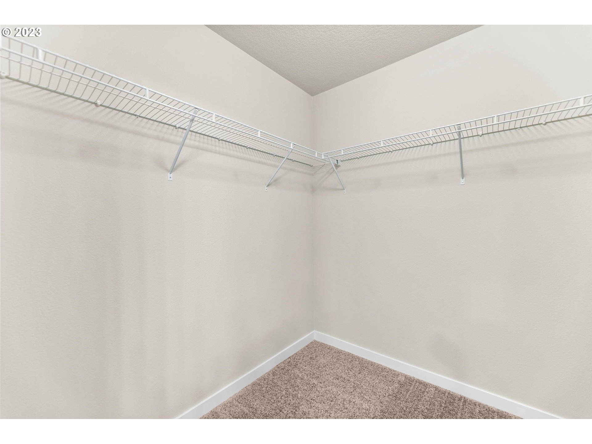 3147 South Kodiak Street, Unit LT798 Cornelius, OR 97113 - Photo 17 of 24 a view of a room with racks on the wall