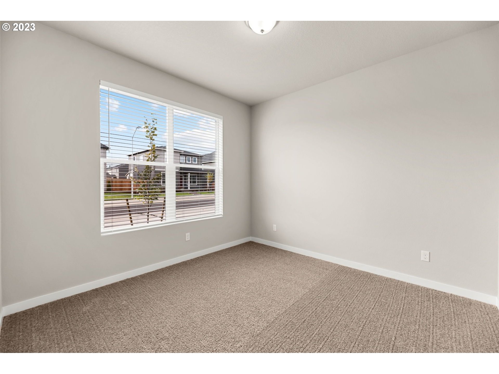 3147 South Kodiak Street, Unit LT798 Cornelius, OR 97113 - Photo 19 of 24 a view of an empty room with a window