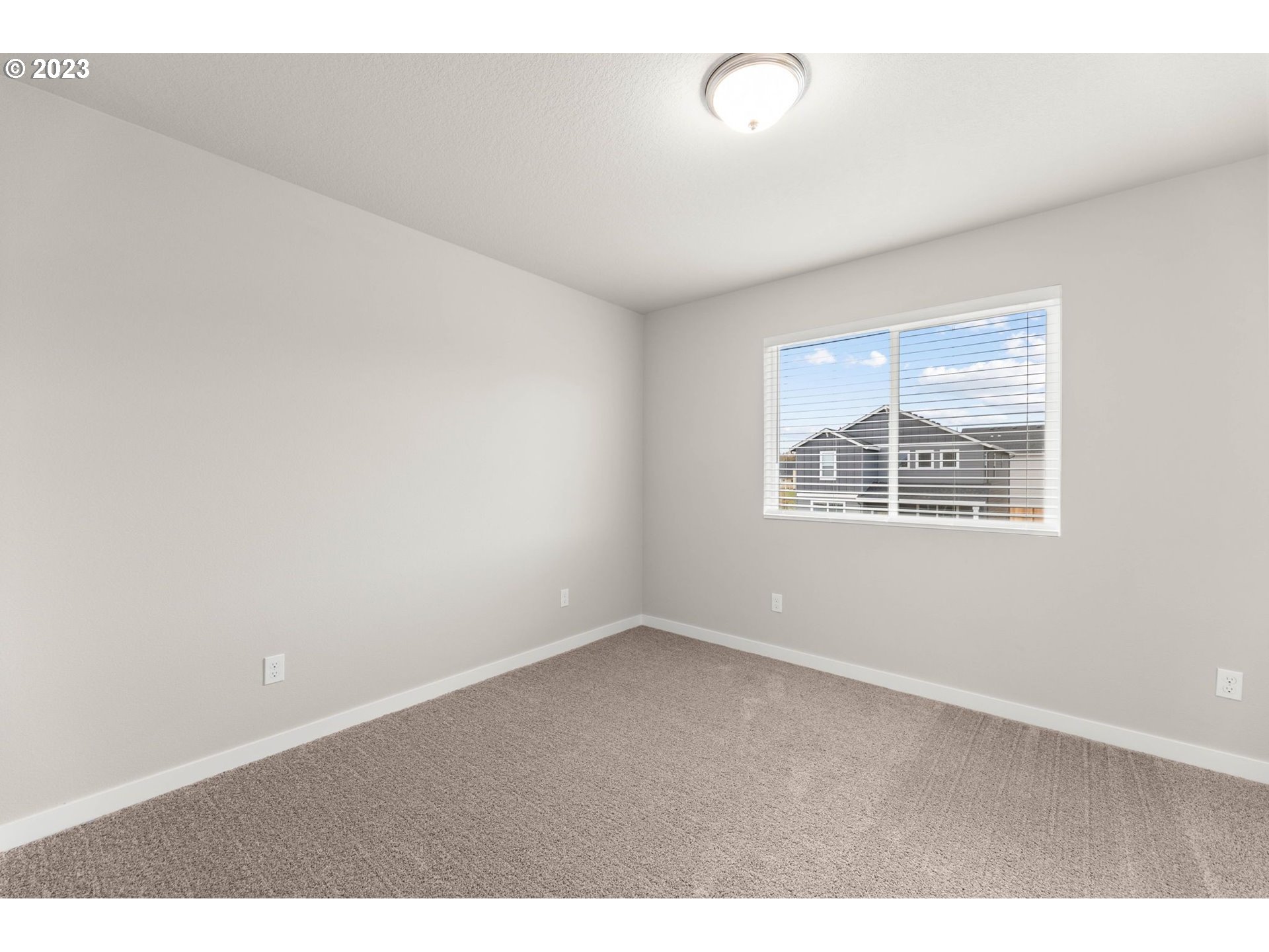 3147 South Kodiak Street, Unit LT798 Cornelius, OR 97113 - Photo 21 of 24 an empty room with windows