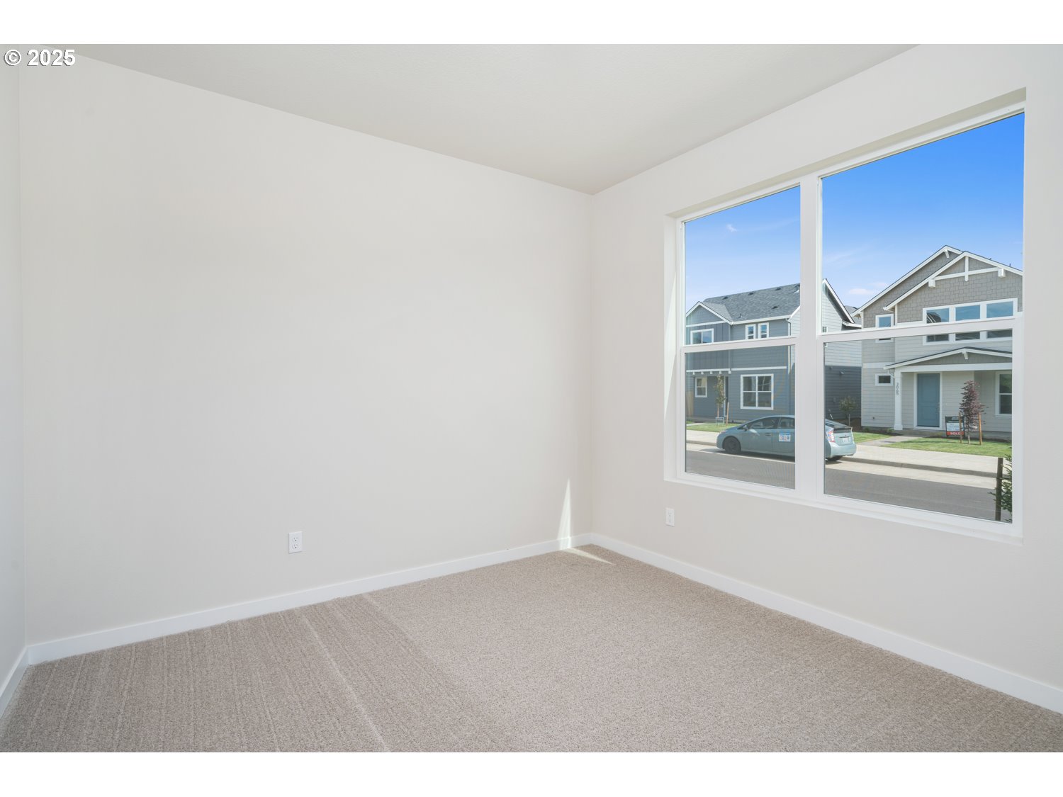 3147 South Kodiak Street, Unit LT798 Cornelius, OR 97113 - Photo 3 of 24 a view of an empty room with a window