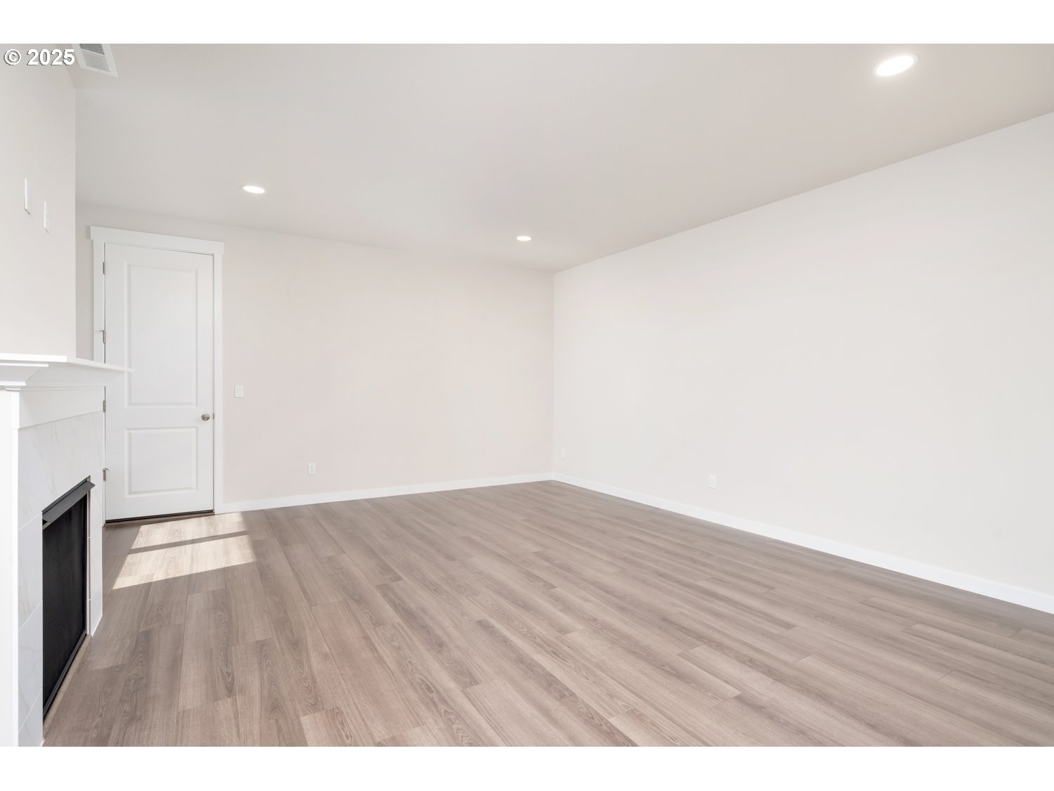 3147 South Kodiak Street, Unit LT798 Cornelius, OR 97113 - Photo 6 of 24 a view of an empty room with wooden floor