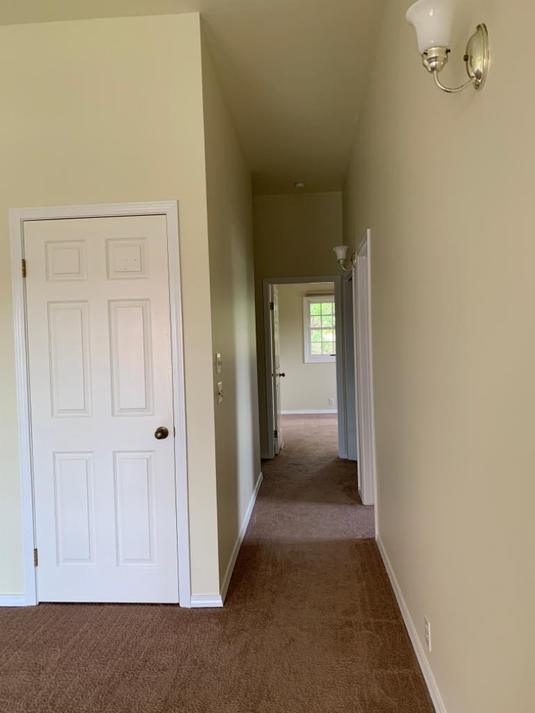 65-1241 Opelo Road, Unit 7 Kamuela, HI 96743 - Photo 11 of 14 a view of a hallway with wooden floor