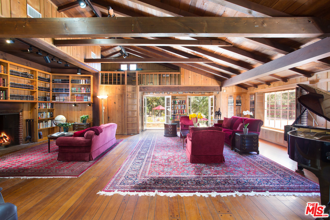 1753 Hidden Valley Road Thousand Oaks, CA 91361 - Photo 14 of 43 a living room with furniture or couch and a fireplace