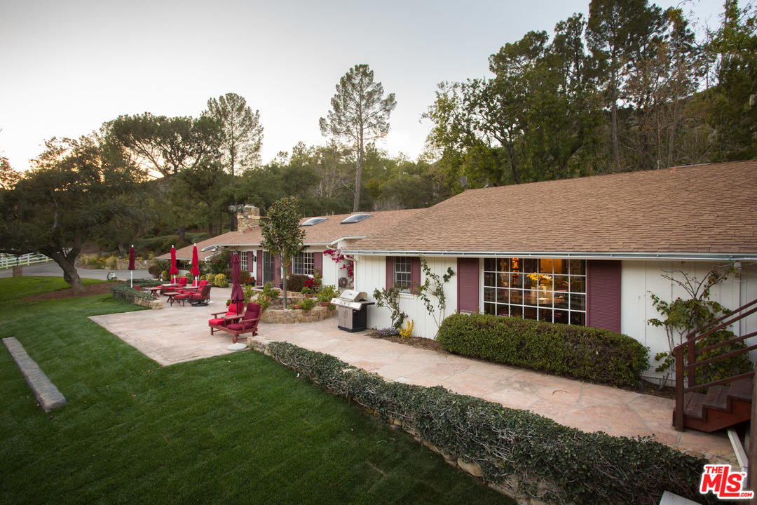 1753 Hidden Valley Road Thousand Oaks, CA 91361 - Photo 20 of 43 a view of a house with outdoor space and garden