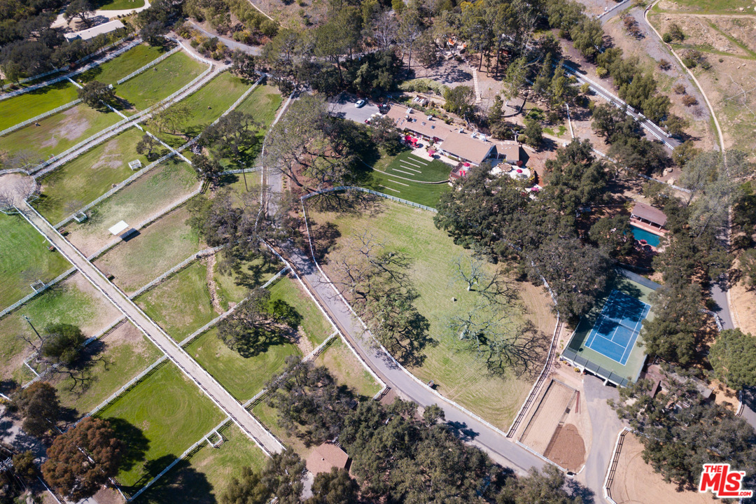 1753 Hidden Valley Road Thousand Oaks, CA 91361 - Photo 3 of 43 an aerial view of a house with a yard and ocean view