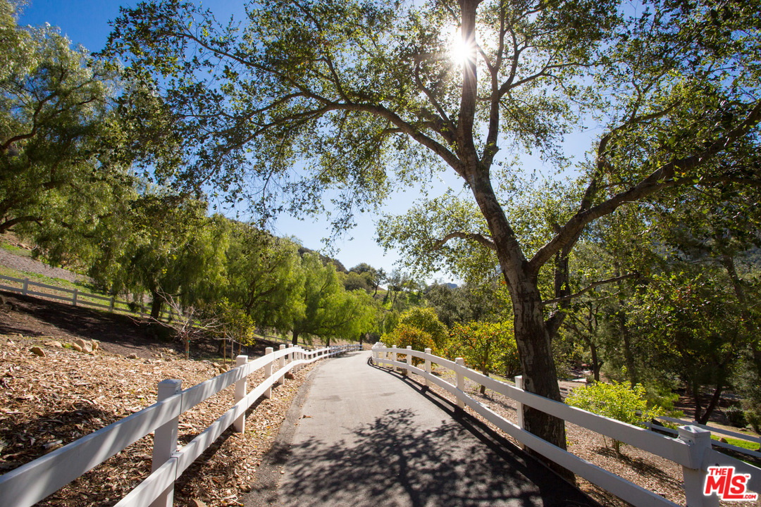 1753 Hidden Valley Road Thousand Oaks, CA 91361 - Photo 22 of 43 a view of a yard with wooden fence
