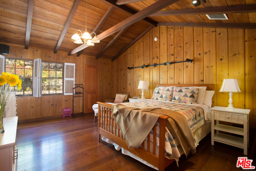 1753 Hidden Valley Road Thousand Oaks, CA 91361 - Photo 25 of 43 a bed room with a bed and a window