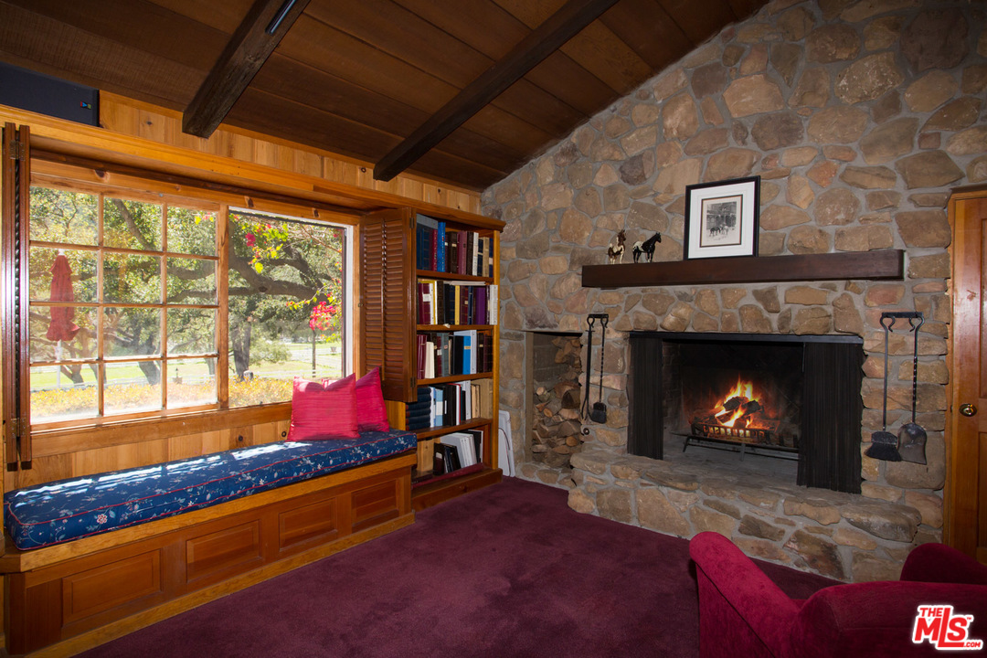 1753 Hidden Valley Road Thousand Oaks, CA 91361 - Photo 32 of 43 a living room with furniture and a fireplace