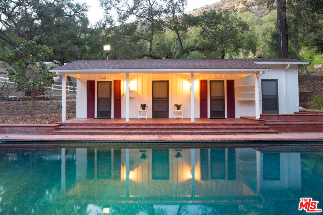1753 Hidden Valley Road Thousand Oaks, CA 91361 - Photo 33 of 43 a view of a house with a swimming pool
