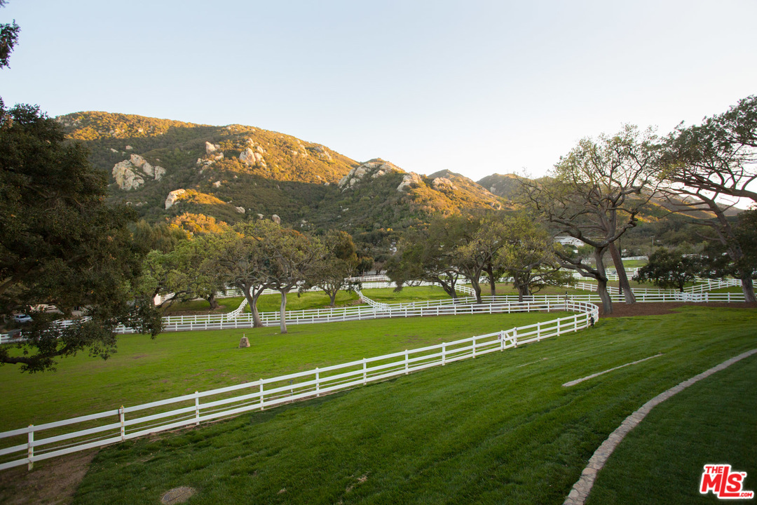1753 Hidden Valley Road Thousand Oaks, CA 91361 - Photo 9 of 43 a view of a golf course with a lake