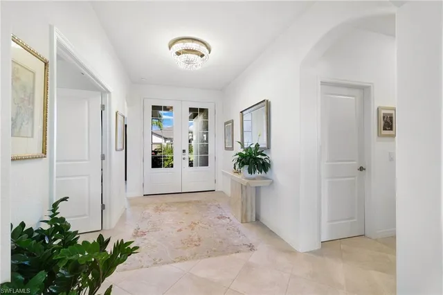 a view of entryway with livingroom and hallway