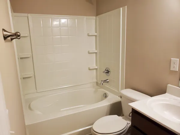 a bathroom with a sink and a toilet