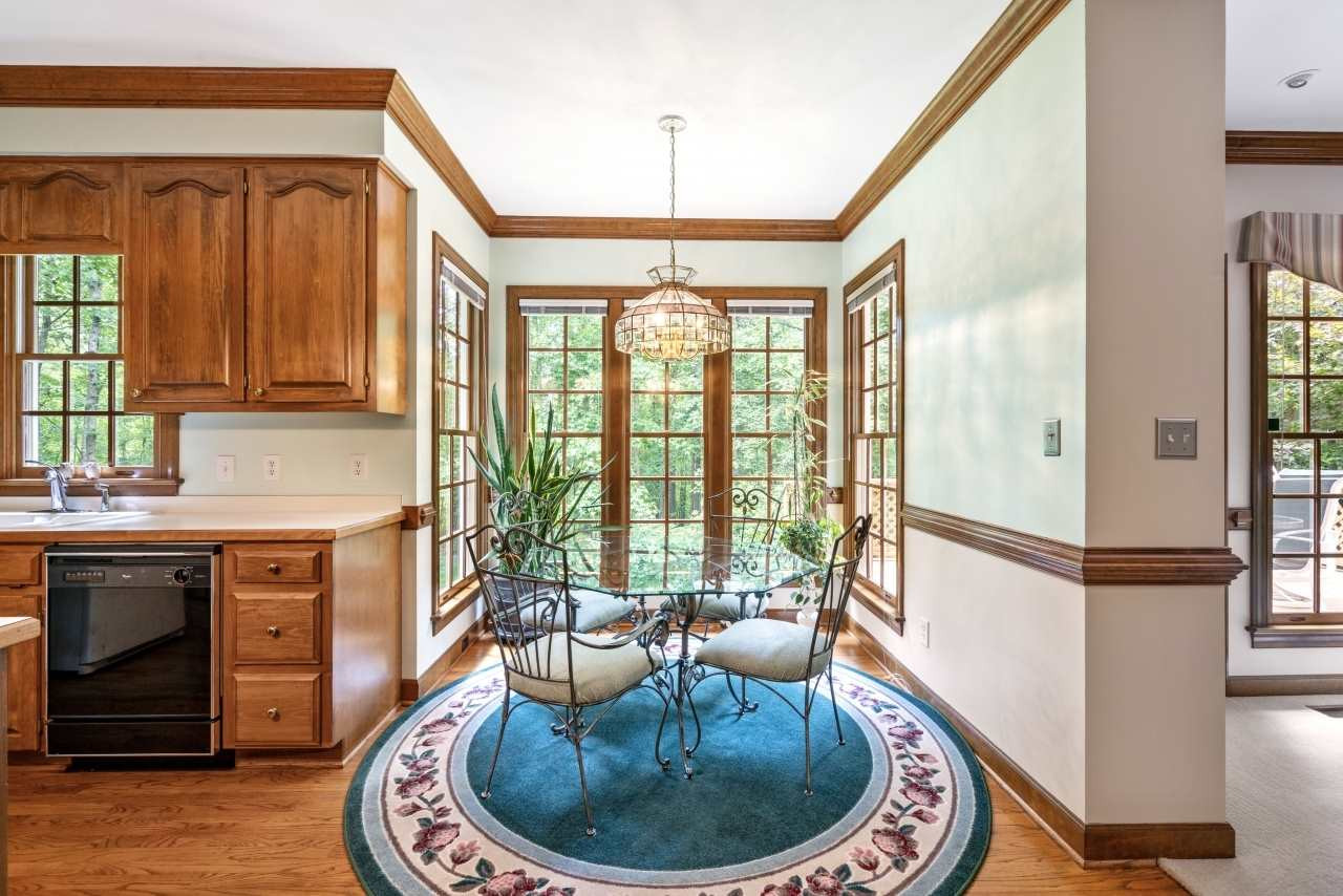 4125 Ridgebrook Bluffs Drive Raleigh, NC 27603 - Photo 11 of 30 Breakfast Nook with Floor to Ceiling Windows