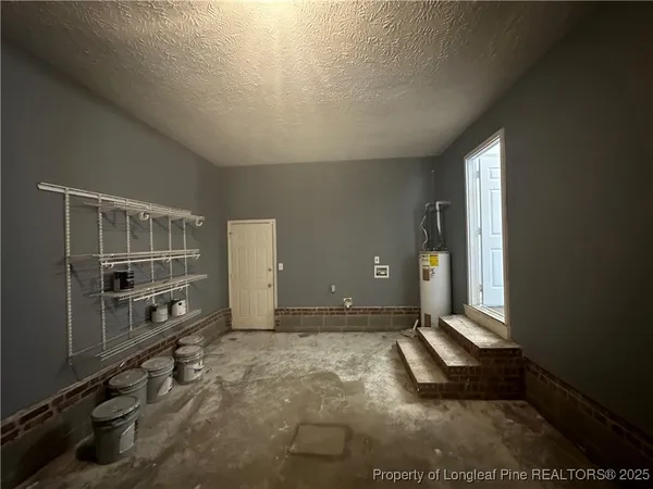 a bathroom with a toilet and a sink